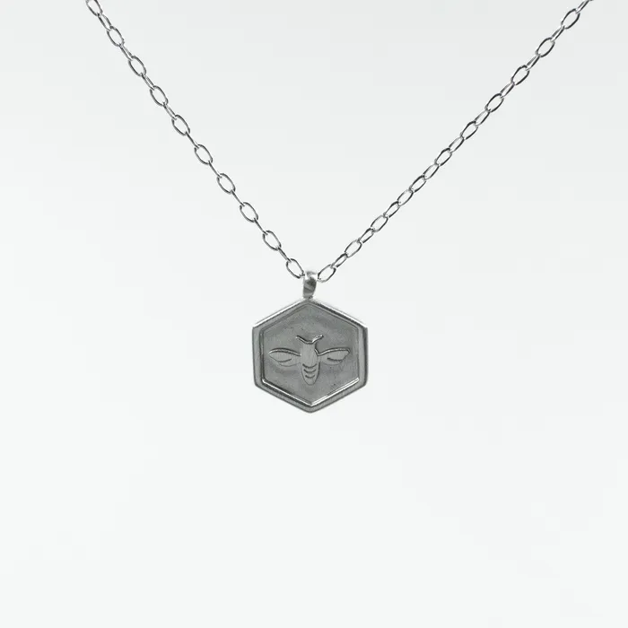 Brushed Silver Hexagon Shaped Honeybee Necklace Tashi Necklaces